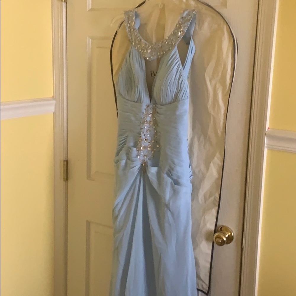 Prom dress was made by JJ’s HOUSE.